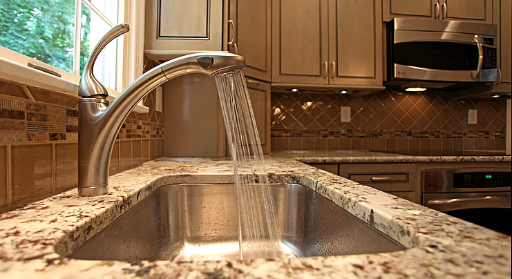 Kitchen with Dark Cabinets Light Countertops