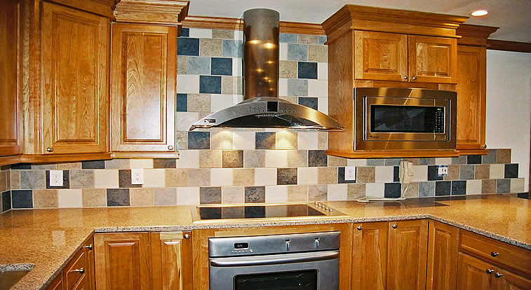 Kitchen backsplash with random colored 6 x 6 tiles