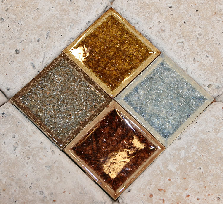 square cracked glass tile accents placed in tumbled marble