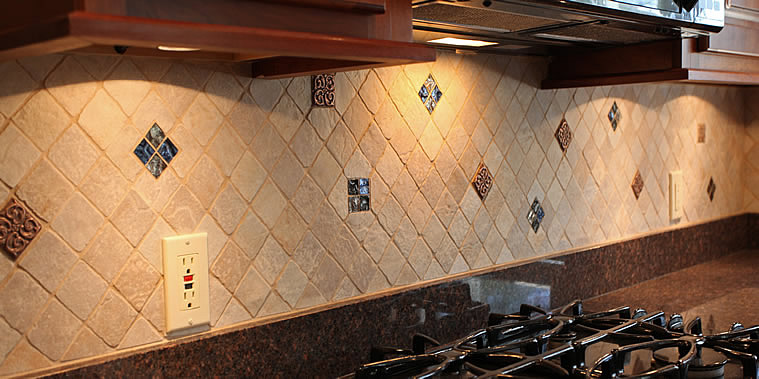 Need simple kitchen backsplash ideas? Just a few accent tiles